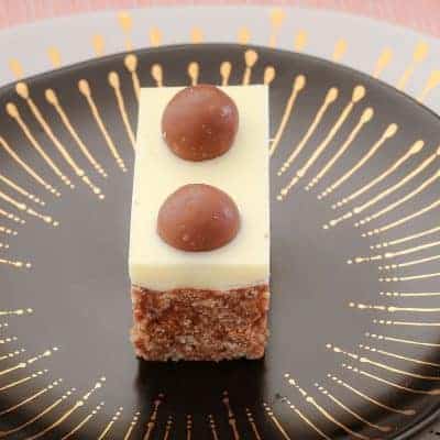 My no-bake chocolate Malteser Slice takes only 10 minutes to prepare... and tastes AMAZING! This is one of my most popular slice recipes ever!