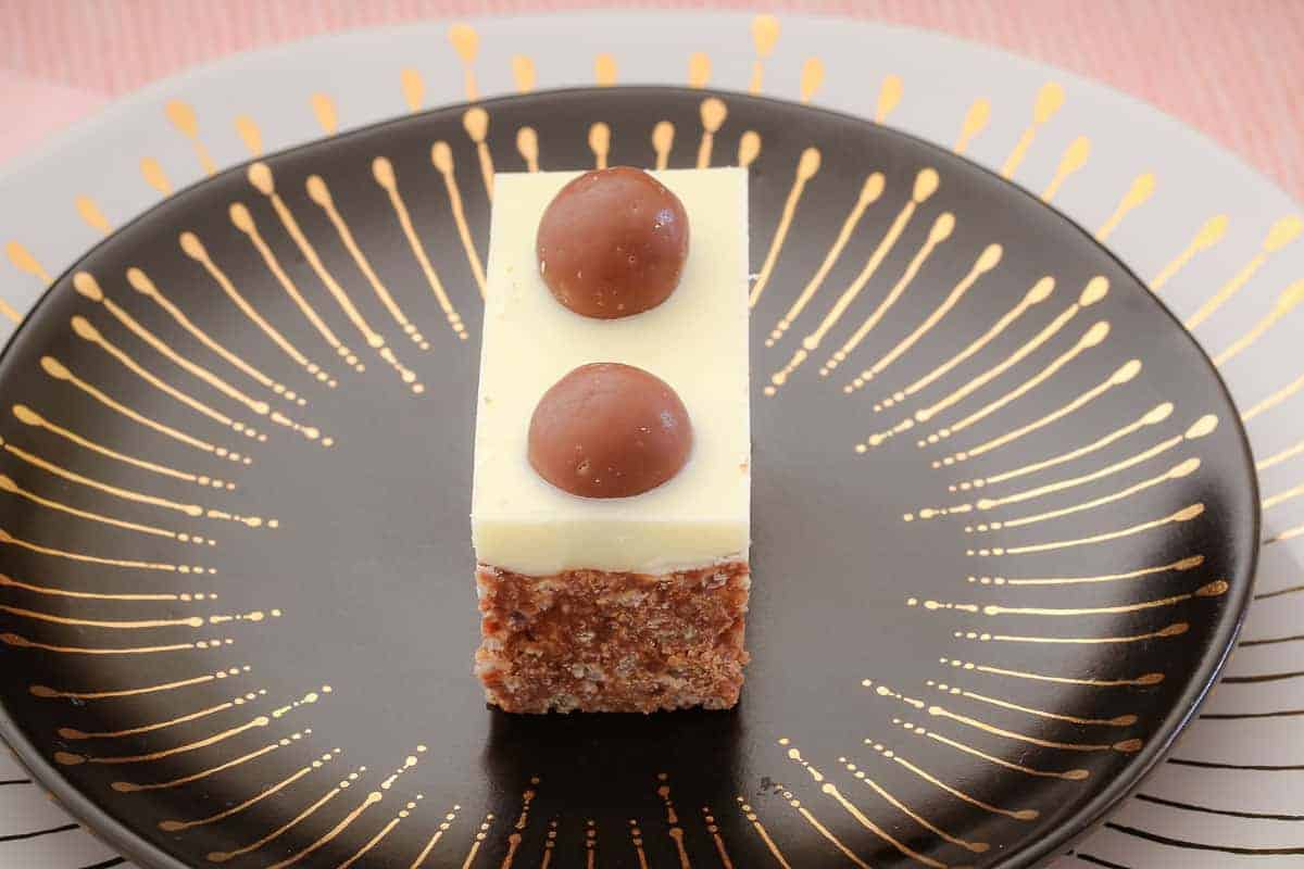 My no-bake chocolate Malteser Slice takes only 10 minutes to prepare... and tastes AMAZING! This is one of my most popular slice recipes ever!
