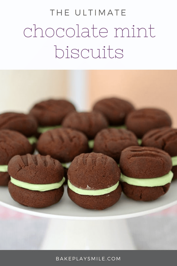 A dozen chocolate cookies on a plate sandwiched together with a mint icing
