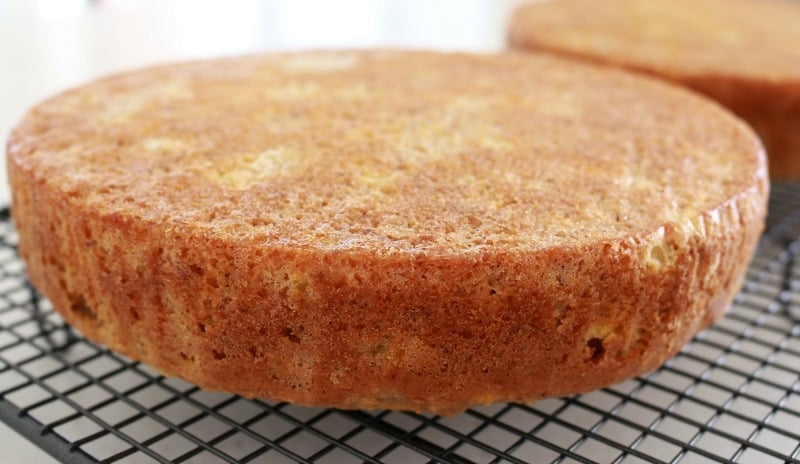 Carrot cake cooling on a baking rack