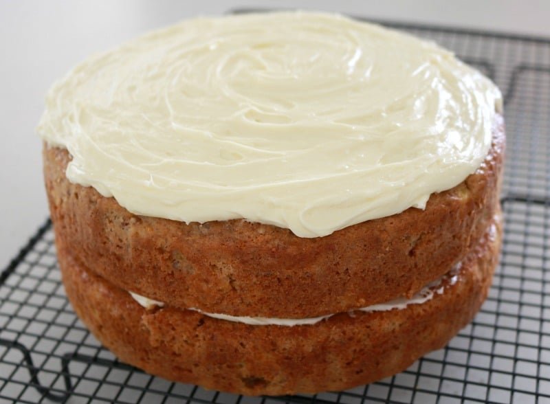 Carrot cake with pineapple topped with cream cheese frosting