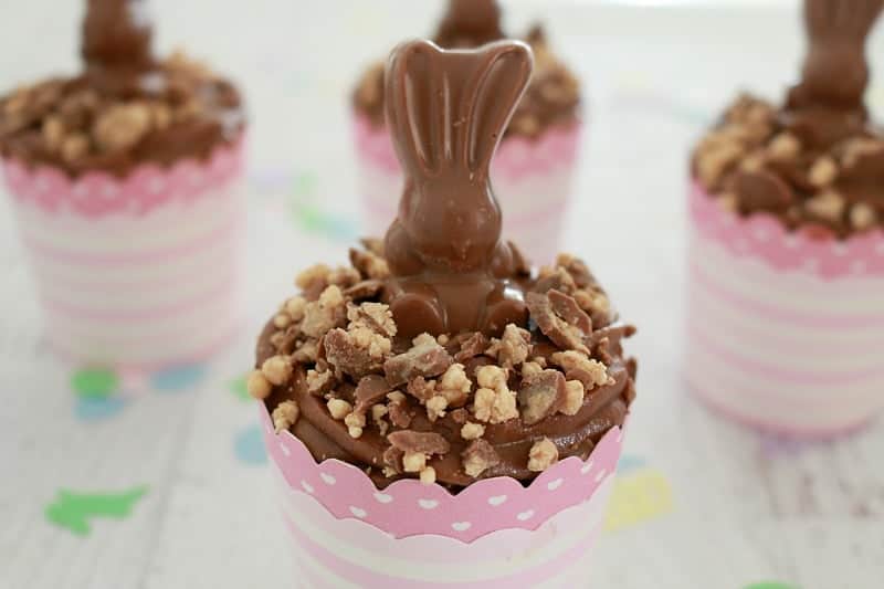 Chocolate Easter cupcakes decorated with Malteser bunnies. 