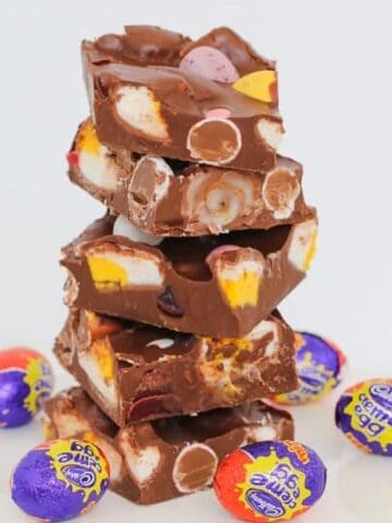 This Easy Easter Rocky Road is filled with marshmallow eggs, mini Cadbury creme eggs, crispy M&M speckled eggs and raspberry lollies! 