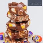 This Easy Easter Rocky Road is filled with marshmallow eggs, mini Cadbury creme eggs, crispy M&M speckled eggs and raspberry lollies! 