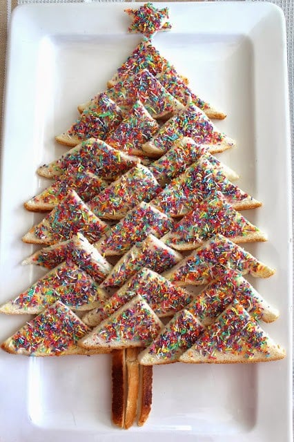 Triangles of fairy bread placed in a shape to resemble a Christmas tree
