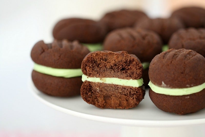 A close up of choc-mint biscuits with one half eaten