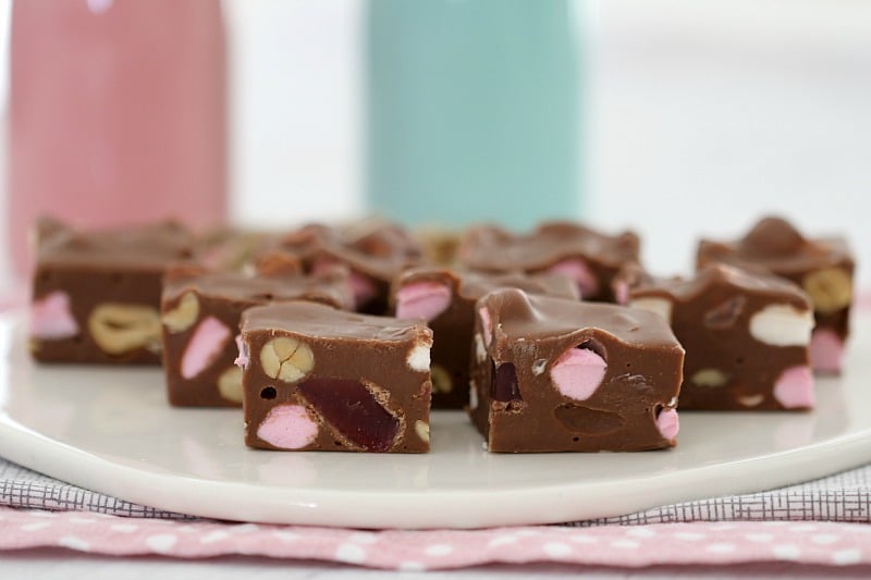Squares of Rocky Road Fudge on a white serving plate