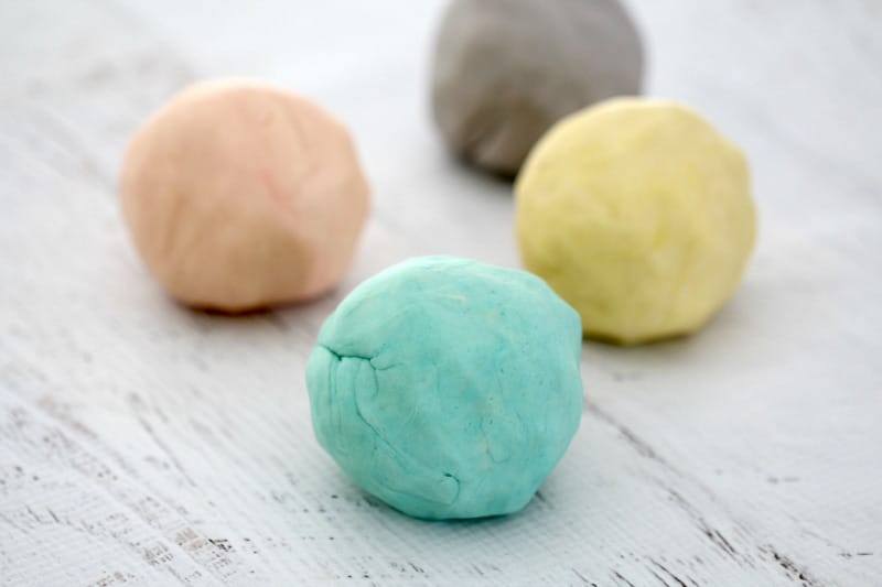 4 Round balls of playdough.