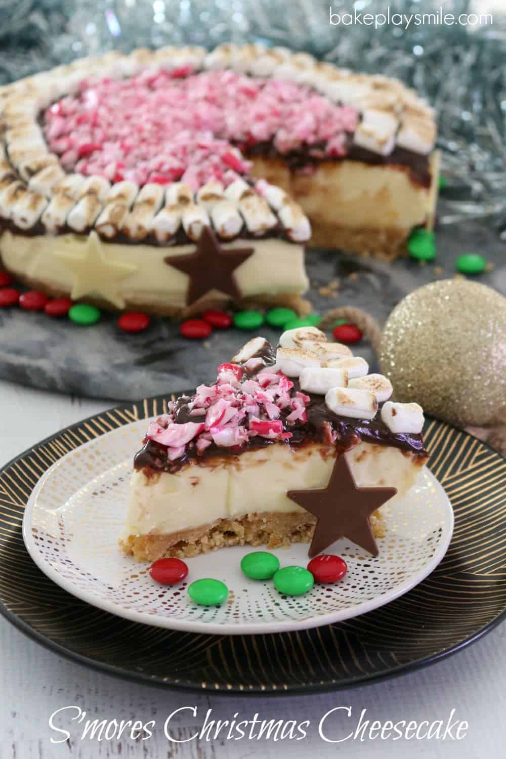 A slice of smore's Christmas cheesecake on a plate