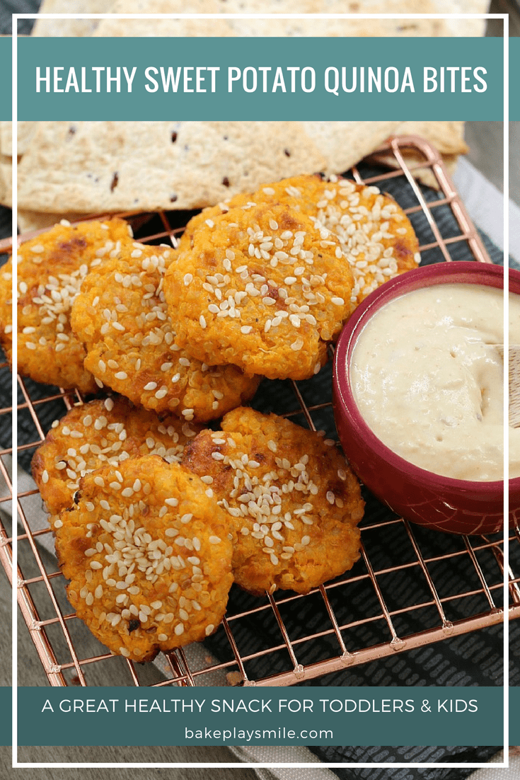 Healthy bites made with sweet potato and quinoa on a copper wire tray, with a pot of dipping sauce beside