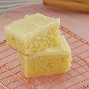The easiest and most delicious baked Lemon Slice with tangy frosting. A quick, simple and classic recipe.