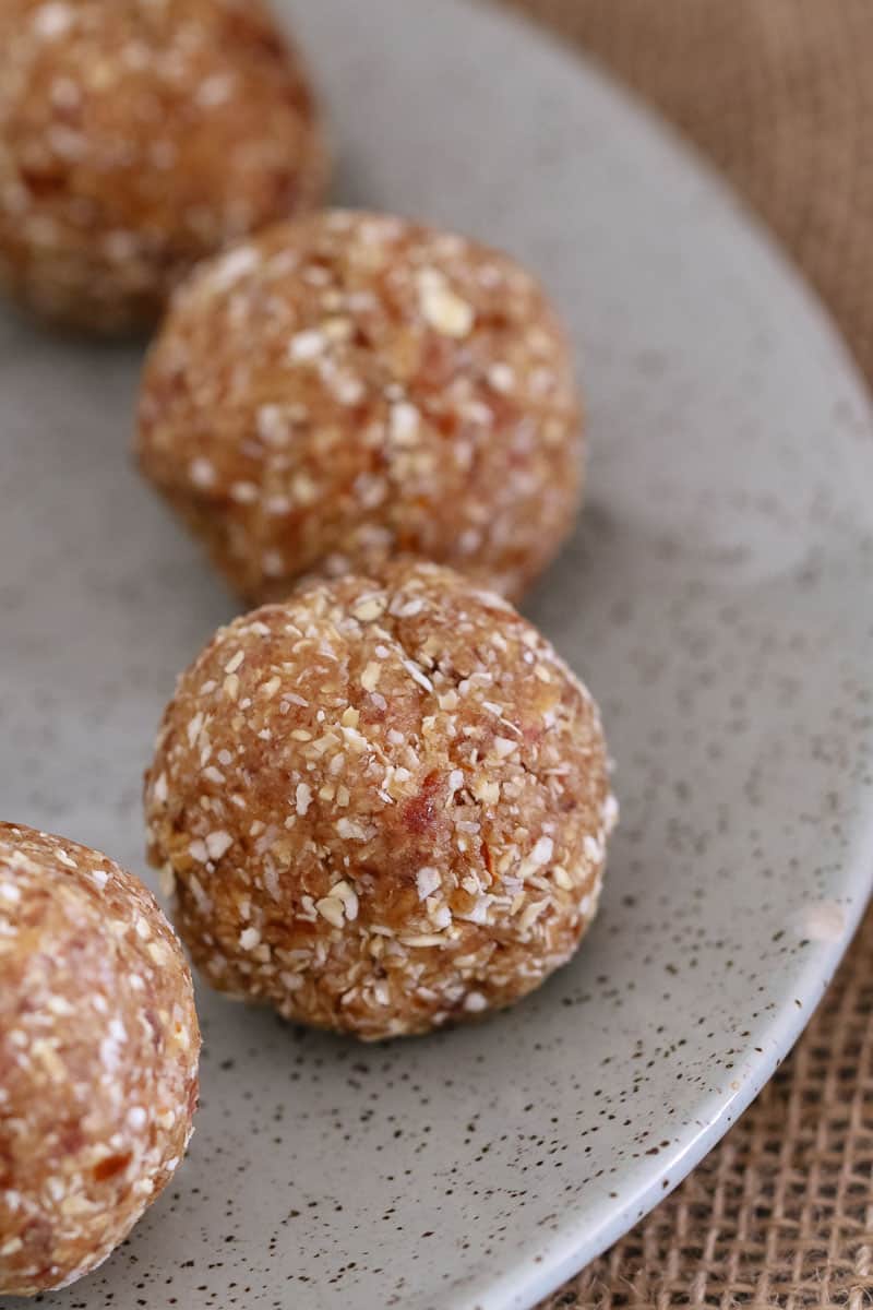 A bliss ball made from dates and rolled oats. 