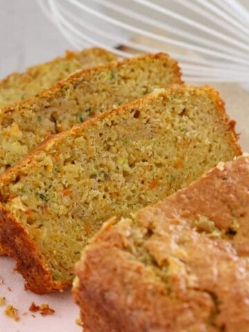 A simple (and nut-free) Apple, Zucchini & Carrot Bread that is moist and delicious. Perfect for lunch boxes or an afternoon tea treat!