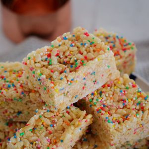 A simple 4 ingredient recipe for making healthier LCM Bars at home using just honey, rice bubbles, coconut oil and sprinkles!