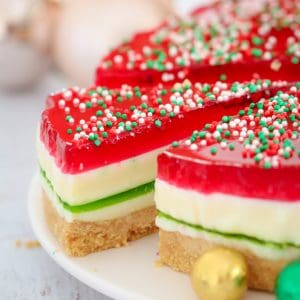 This really is the BEST Christmas Jelly Cake ever... with 5 pretty layers that make it the perfect no-bake Christmas dessert! Just like a traditional jelly slice... but with a Christmas make