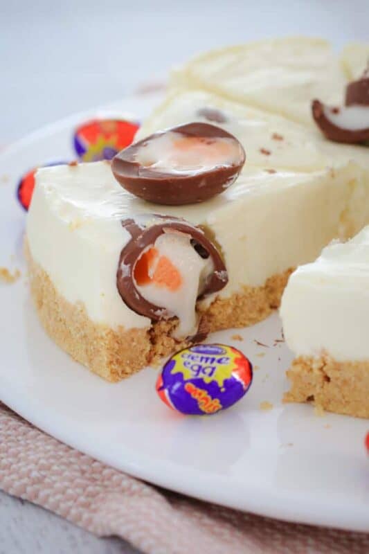A white chocolate and Cadbury Creme Egg Cheesecake that's perfect for any chocoholic! Completely no-bake, super simple to make and totally delicious!!&nbsp;