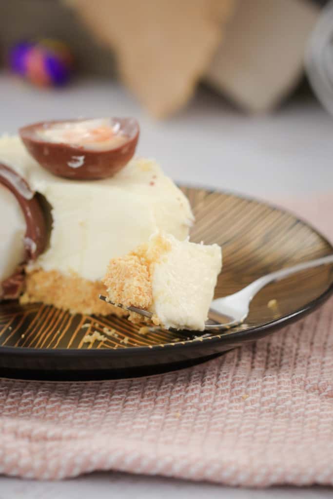 A bite of easter cheesecake on a fork. 