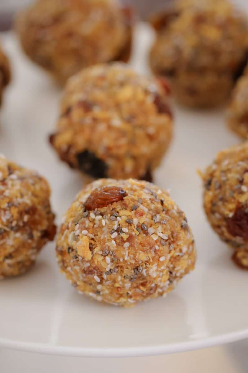 A close up of Weet Bix Bliss Balls filled with sultanas, coconut and chia seeds