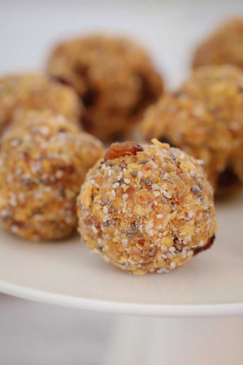 A close up of Weet-Bix Bliss Balls showing sultanas, coconut and chia seeds
