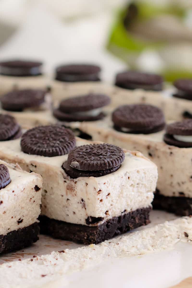 Oreo cheesecake slice bars with mini Oreo's on top of each square