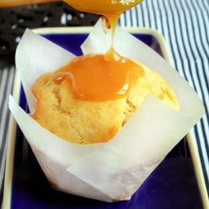 The most delicious Salted Caramel Banana Muffins... soft, fluffy muffins with a creamy salted caramel drizzle. This are an absolute must-make!