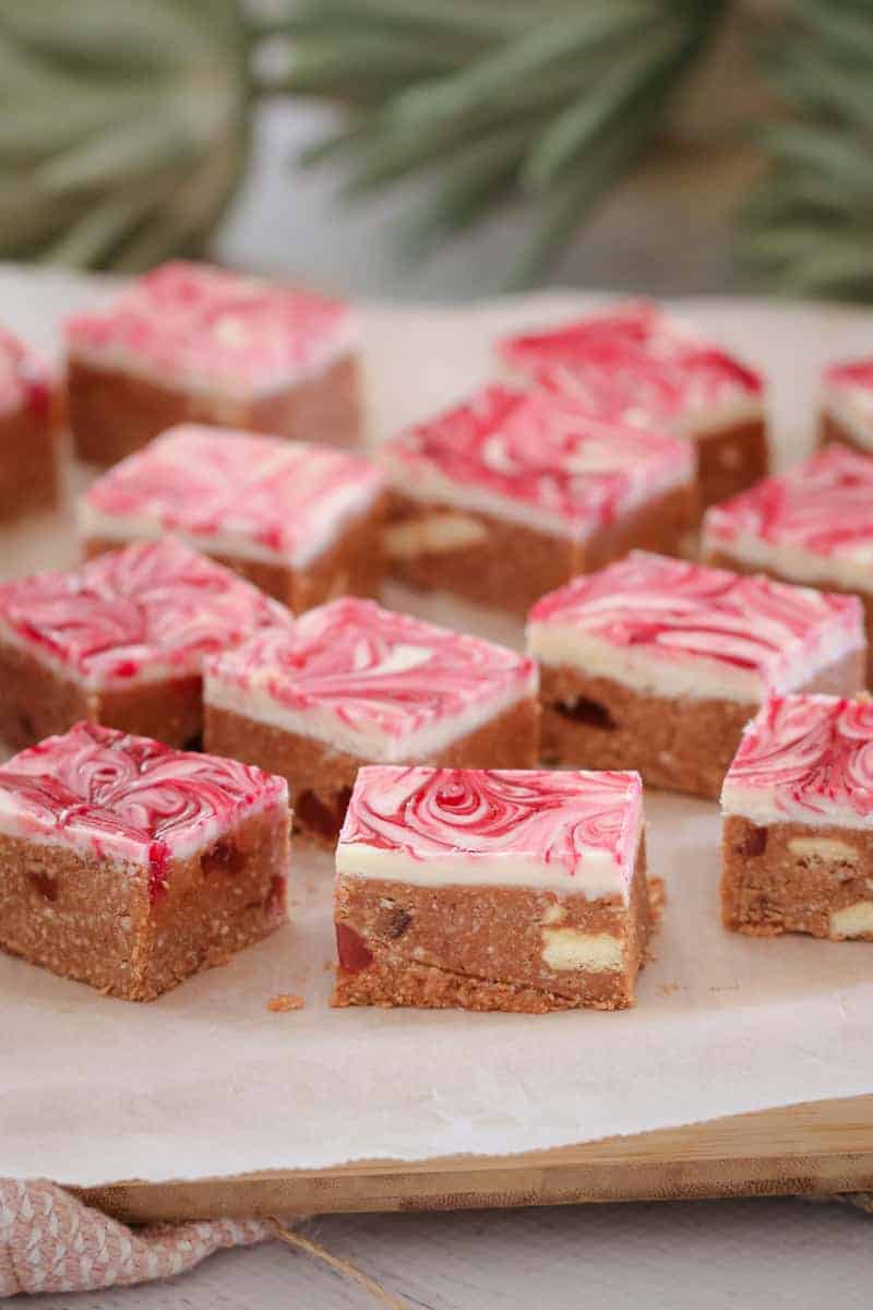 Pieces of slice made with Turkish Delight with a pink and white topping.