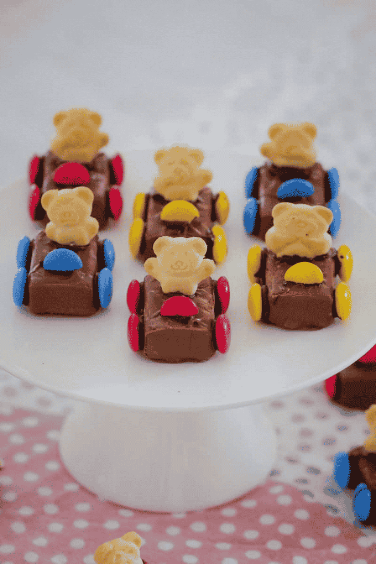 Tiny Teddy racing cars made with chocolate lined up.