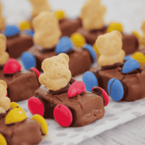 Tiny Teddy racing cars in lines.