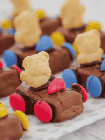 Tiny Teddy racing cars in lines.