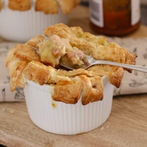 Creamy Chicken, Leek & Bacon Pies topped with crispy puff pastry are easy to make and taste delicious... a classic winter dinner. Printable conventional and Thermomix recipes included.