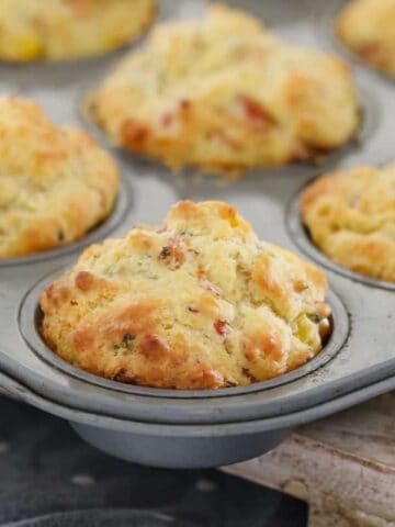 A super easy savoury muffins recipe made with ham, corn, cheese and chives... perfect for lunch boxes, as a side to a bowl of soup or on their own! Printable Thermomix and conventional recipe cards included. 