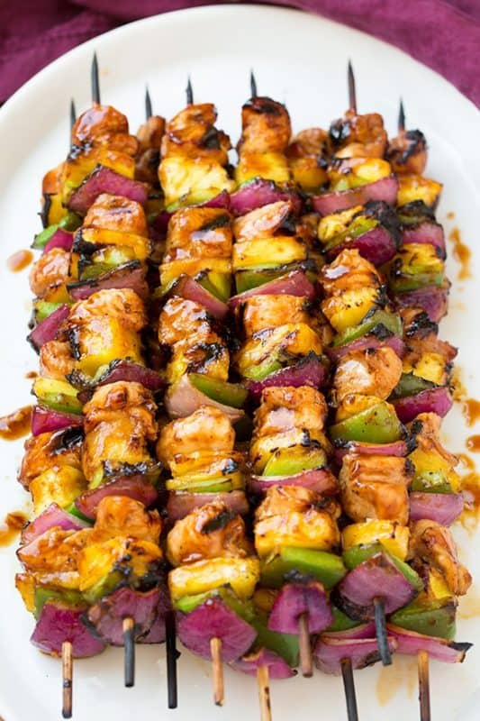 Grilled chicken skewer kebabs with red onion, capsicum and pineapple. 