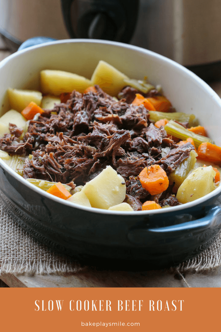 A roast beef cooked in the slow cooker with roast vegetables. 