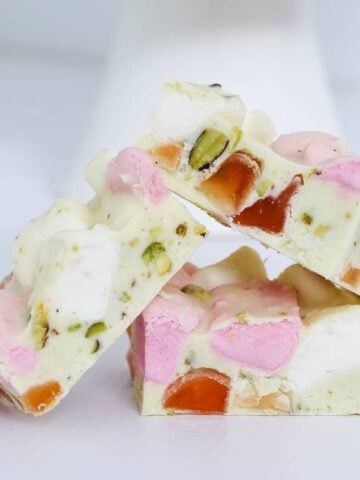 A deliciously simple 4 ingredient White Chocolate Rocky Road recipe made with marshmallows, turkish delight and pistachios.