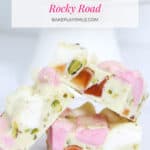 A pinterest image of 3 pieces of white chocolate rocky road.