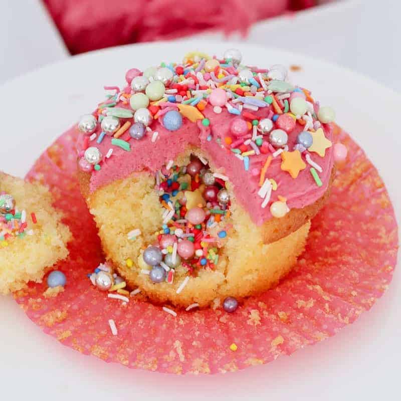Kids party cupcakes with a surprise filling of sprinkles.