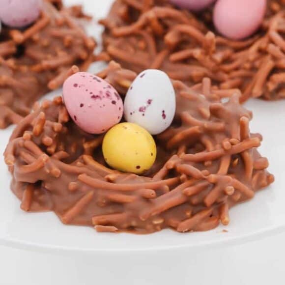 A simple 4 ingredient Chocolate Easter Birds Nests recipe made with Changs fried noodes, melted chocolate, peanut butter and mini Easter eggs.