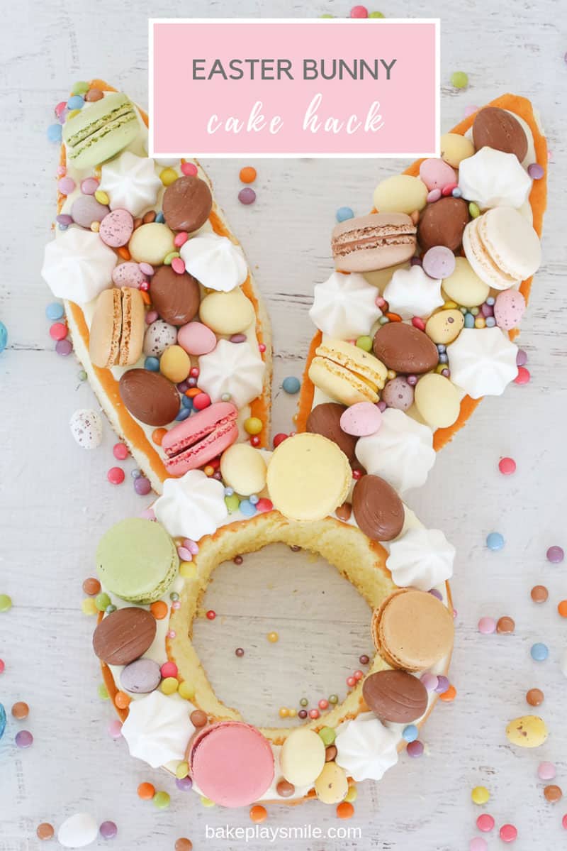A super cute Easter bunny cake hack made from store-bought unfilled sponge cakes, frosting, macarons, Easter eggs, mini meringues & more!