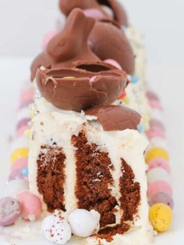 Our Easter Chocolate Ripple Cake is a fun twist on a favourite Australian dessert. A 10 minute recipe made using Arnott's chocolate ripple biscuits, whipped cream and decorated with Easter eggs. 