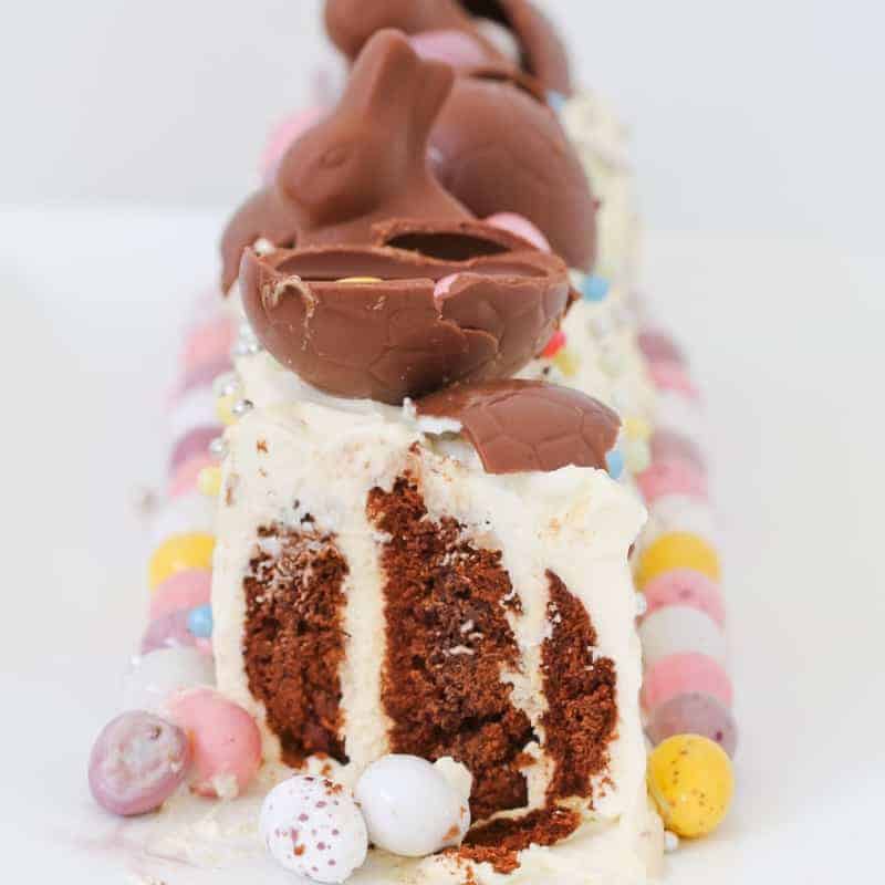 Our Easter Chocolate Ripple Cake is a fun twist on a favourite Australian dessert. A 10 minute recipe made using Arnott's chocolate ripple biscuits, whipped cream and decorated with Easter eggs. 