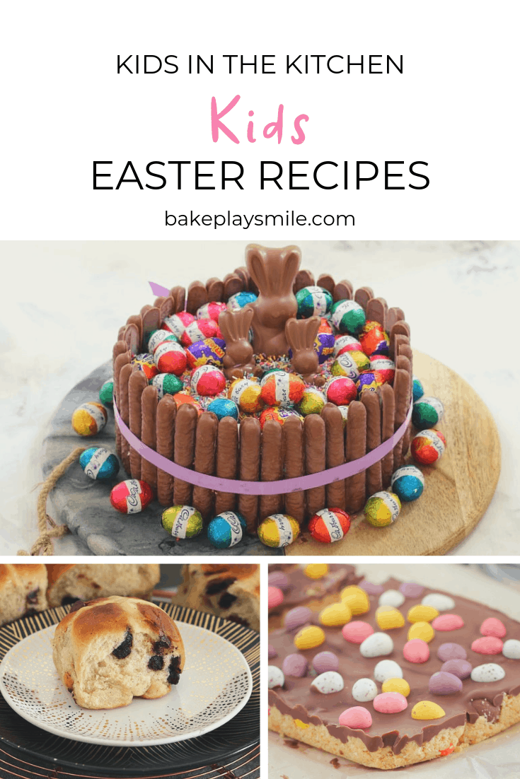 Cake decorated with chocolate finger biscuits, chocolate bunnies and mini Easter eggs on a board