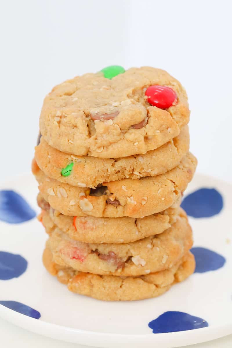 A stack of peanut butter cookies made with M&Ms and chocolate chips.