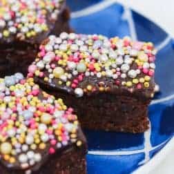 A super easy chocolate slice with chocolate icing and sprinkles... a good old fashioned favourite with the kids (and adults too!).