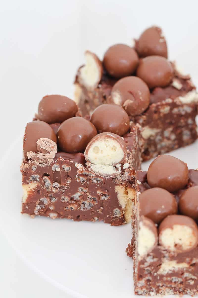 Chocolate crackle refrigerator slice with Whoppers. 