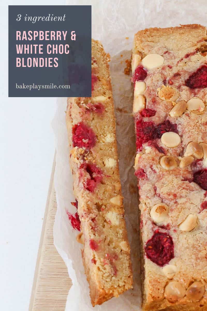 A cut slice filled with raspberries and white chocolate