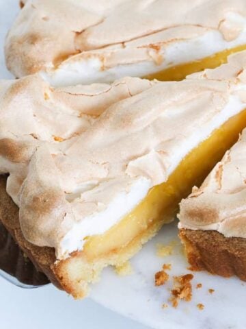 A classic homemade Lemon Meringue Pie recipe with three perfect layers of melt-in-your-mouth pie crust, a creamy lemon filling and a fluffy meringue topping. 