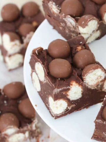 The easiest Microwave Malteser Fudge recipe made with just 3 ingredients (chocolate, sweetened condensed milk & Maltesers)... and in less than 5 minutes! 