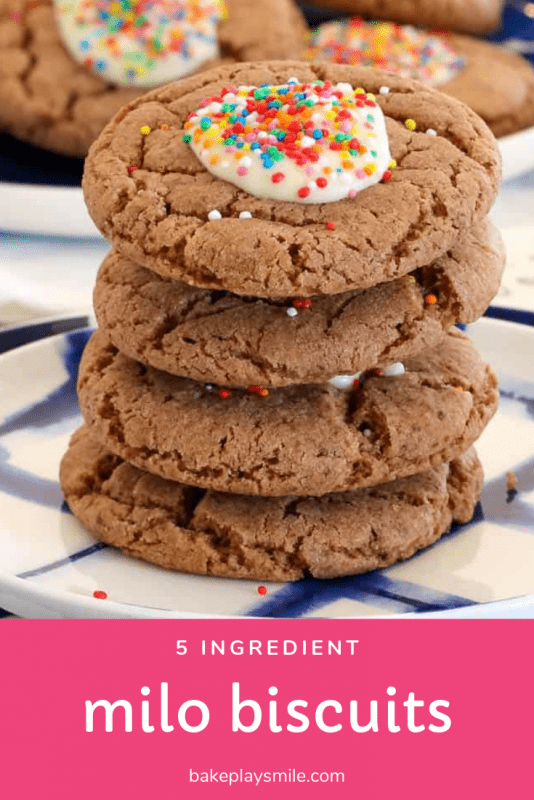 A stack of homemade milo biscuits with white chocolate and sprinkles on top.