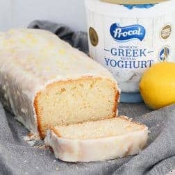 A lemon and yoghurt loaf made with greek yoghurt and covered in a lemon icing glaze.