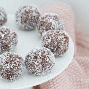 No-Bake Rum Balls made with coconut, biscuits, condensed milk and cocoa powder.